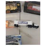 Set of 4 Collectible Die-Cast Trucks Including NASCAR, NFL, and Bud Light Models