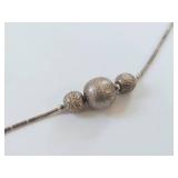 Elegant Silver Anklet with Textured Beads