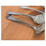 Lot of (7) 282-grams (total) Silverplated Flatware - 1847 Rogers Bros Gravy Ladle, Gorham Gravy Ladle, W.M. Rogers Camelot-Melody Fruit Spoons (x2), Sugar Sifter, Decorative Wide Spoon, Decorative Tea
