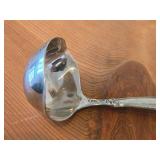 Lot of (7) 282-grams (total) Silverplated Flatware - 1847 Rogers Bros Gravy Ladle, Gorham Gravy Ladle, W.M. Rogers Camelot-Melody Fruit Spoons (x2), Sugar Sifter, Decorative Wide Spoon, Decorative Tea