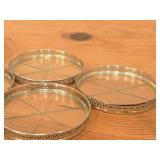 (6) Webster Co. American Art Sterling Silver and Glass Coasters, (1) Silverplated Wine Bottle Coaster