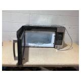 GE 1.7 cu. ft. Over the Range Microwave with Sensor Cooking in Stainless Steel Model # JVM6175SK6SS (Missing All Instalation Parts, Minor Transit Damage)