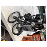 THREE WHEELED STROLLER