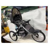 THREE WHEELED STROLLER