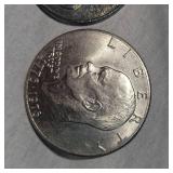 1991 Ertl Token Dollar and 1976 Ike "Silver" Dollar