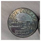 1991 Ertl Token Dollar and 1976 Ike "Silver" Dollar