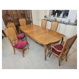Elegant French Provincial Dining Table with Cane-Back Chairs