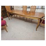 Elegant French Provincial Dining Table with Cane-Back Chairs