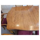 Elegant French Provincial Dining Table with Cane-Back Chairs