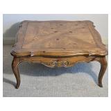 Carved Wood Coffee Table with Curved Legs