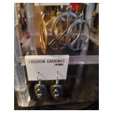 Large Collection of Unused Earrings and Display Rack