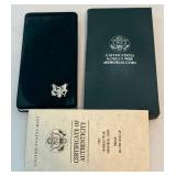 1991 Korean War Proof Memorial Dollar Coin - original package with COA, slight fire damage is evident