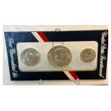 1776-1976 Bicentennial 40% SILVER Uncirculated 3 Coin Set - original package with COA, packaging shows minimal water and fire damage