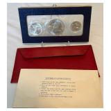 1776-1976 Bicentennial 40% SILVER Uncirculated 3 Coin Set - original package with COA, packaging shows minimal water and fire damage
