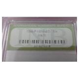 (2) Slabbed Kennedy Half Dollars