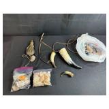 Collection of Vintage Powder Horns, Shells, Stones, and Brass Powder Flask