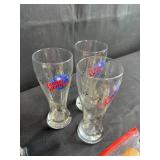 Planet Hollywood Glasses, Marble Cactus Bookends, and Mixed Napkin Ring Lot