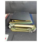 Assorted Office Supplies Including Paper Trimmer, Hanging File Folders, Ruler, and Coca-Cola Card Holder