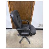 Black Padded Office Chair with Armrests and Casters