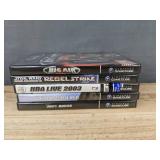 5 Nintendo GameCube Games - Star Wars Rebel Strike Rogue Squadron II, Big Air Freestyle, Super Smash Bros. Melee, NBA Live 2003, and Luigi