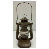 Vintage Primitive Items Including Small Oil Lamp, Whiskey Style Jug With Imprint And More