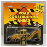 Misc. Vintage Toys Including ERTL Die-Cast Ford Tractor Loader Backhoe (NEW), Slot Car Track With Cars (Missing Some Track) And More
