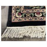 Persian-Style Floral Oriental Rug - Black Field with Fringed Edges