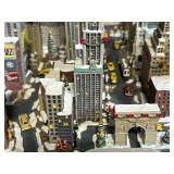 Miniature Snowy City Diorama with Skyscrapers, Cars & Christmas Details