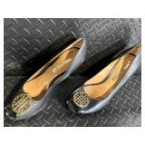 Audrey Brooke Black Leather Peep-Toe Wedge Heels - Gold Circular Medallion Toe Emblem