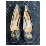 Audrey Brooke Black Leather Peep-Toe Wedge Heels - Gold Circular Medallion Toe Emblem