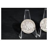 Three Walking Liberty Half Dollars (U.S. 1916-1947) on Display Stands
