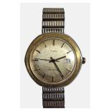 Vintage Timex Marlin Gold-tone Manual Wind Watch with Date Feature.