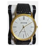 Collectible Criterion gold-tone quartz dress wristwatch from the 1970s and 1980s.