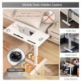 Adjustable overbed table for hospital or home. It has wheels and a USB port to charge your devices.