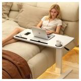 Adjustable overbed table for hospital or home. It has wheels and a USB port to charge your devices.