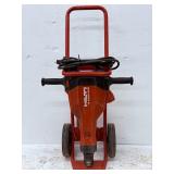 High-Performance Hilti TE 2000-AVR electric jackhammer. This heavy-duty, 15-amp concrete breaker is renowned in the construction industry for its robust power and ergonomic design, ideal for demanding