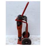 High-Performance Hilti TE 2000-AVR electric jackhammer. This heavy-duty, 15-amp concrete breaker is renowned in the construction industry for its robust power and ergonomic design, ideal for demanding