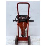 High-Performance Hilti TE 2000-AVR electric jackhammer. This heavy-duty, 15-amp concrete breaker is renowned in the construction industry for its robust power and ergonomic design, ideal for demanding