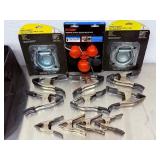 Heavy Duty Trailer Tie-Down D-Rings, CURT Coupler Lock, and Metal Spring Clamps.