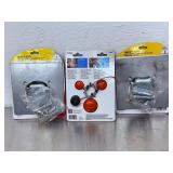 Heavy Duty Trailer Tie-Down D-Rings, CURT Coupler Lock, and Metal Spring Clamps.