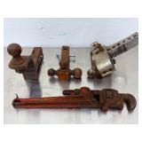 Lot of Used Heavy-Duty Equipment: Three Trailer Hitches (Fixed & Tri-Ball & Adjustable)And a 18 inch pipe wrench and a 24 inch pipe wrench.
