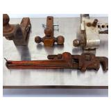 Lot of Used Heavy-Duty Equipment: Three Trailer Hitches (Fixed & Tri-Ball & Adjustable)And a 18 inch pipe wrench and a 24 inch pipe wrench.