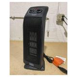 BLACK+DECKER Oscillating Ceramic Tower Heater, 1500W Space Heater and Fan Combo with Adjustable Thermostat, 3 Settings, For Home and Office, BHTC571 Black