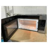 GE 1.6 Cu. Ft. Over-the-Range Microwave Oven Model #: JVM3160RF9SS