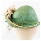 Green Straw Hat with Cream Floral Accent, Net Veil, and Ribbon Trim - Vintage Style