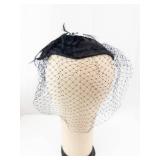 Black Satin Pillbox Hat with Net Veil and Feather Accent