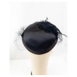 Black Satin Pillbox Hat with Net Veil and Feather Accent