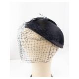 Black Satin Pillbox Hat with Net Veil and Feather Accent