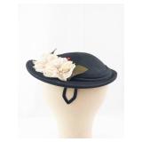 Black Floral Fascinator Hat With Cream Flowers And Green Leaves - Headpiece