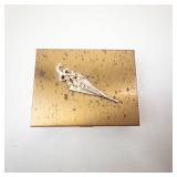 Vintage Gold-Tone Vanity Compact with Mirror, Amber-Toned Base, and Rhinestone Brooch